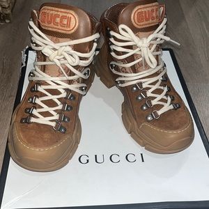 Women Gucci Flashtreck high-top sneakers.